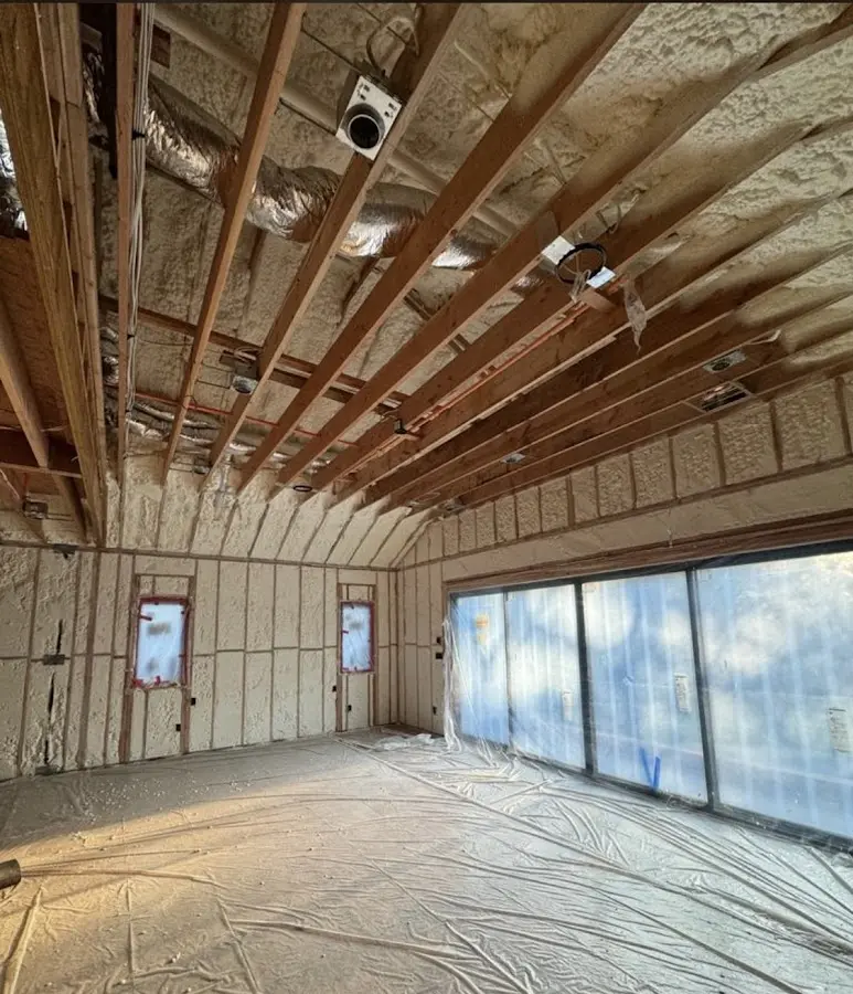 Interior walls and ceiling insulated with spray foam during new construction in Williston